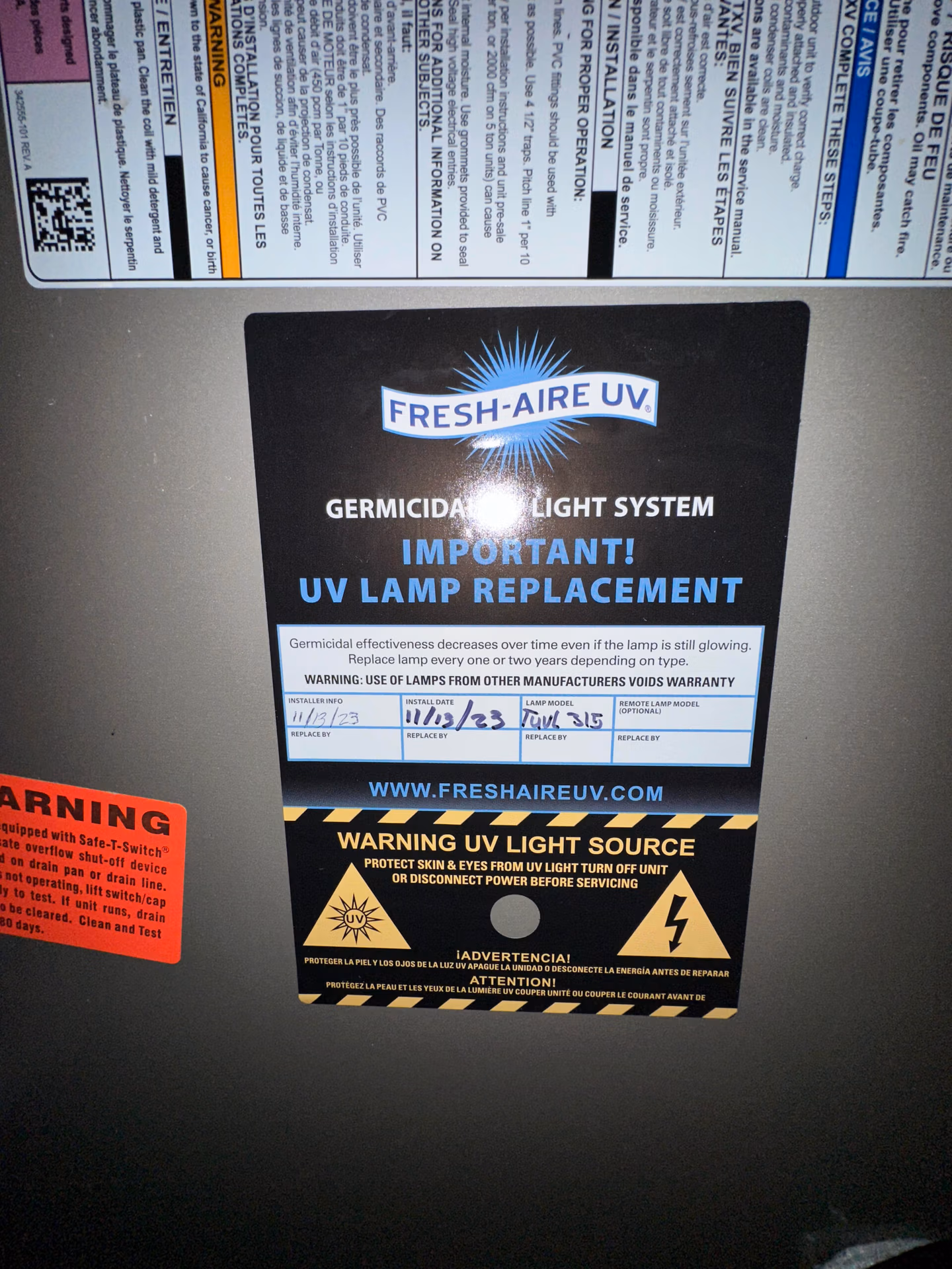 Close-up of a Fresh-Aire UV germicidal light system label showing UV lamp replacement schedule.