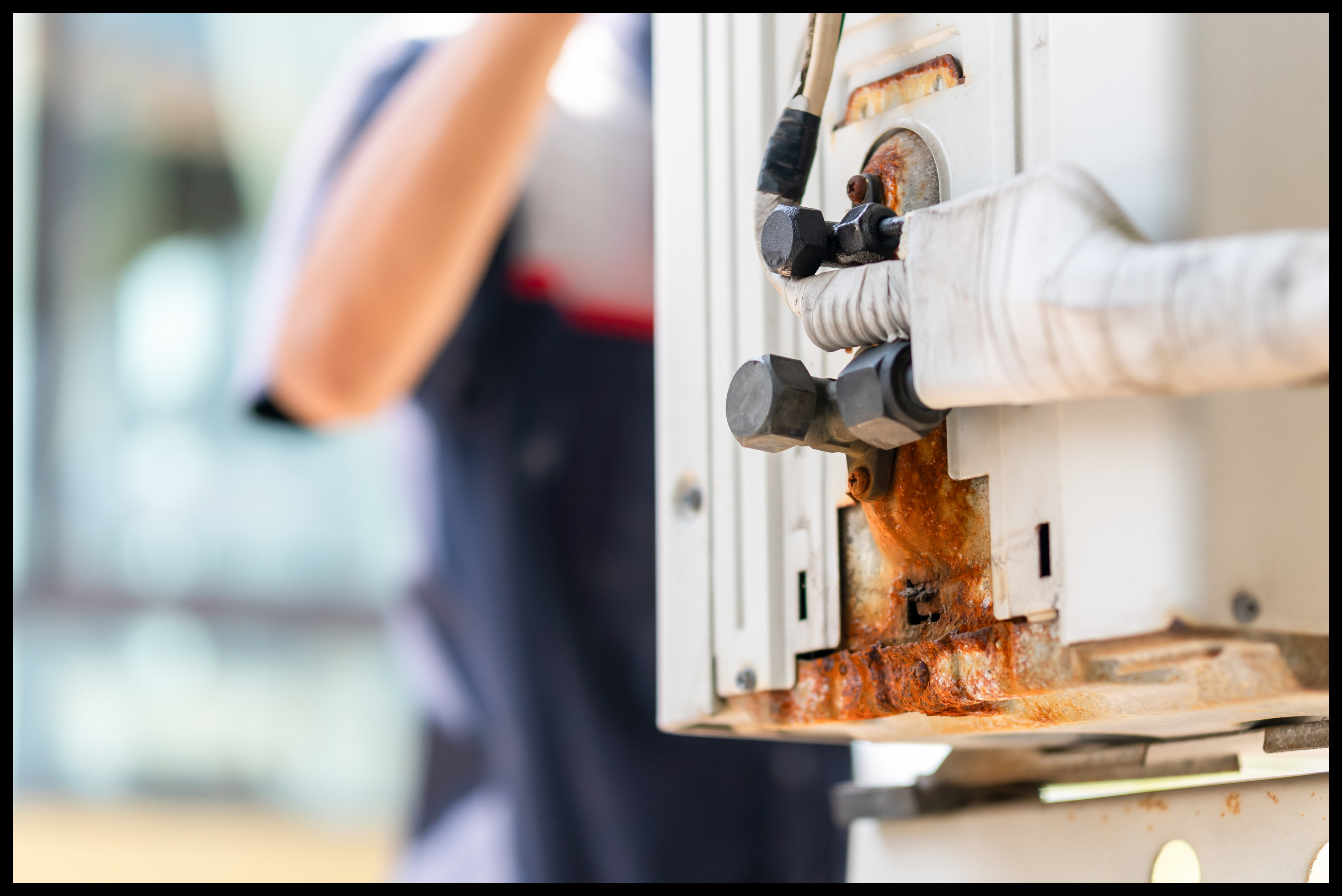 Close-up of corroded HVAC unit connection