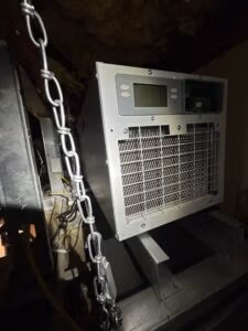 Attic dehumidifier professionally installed by Green Fox Air Quality to control humidity, prevent mold growth, and stop ductwork from sweating