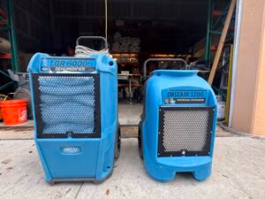 Dri-Eaz LGR 6000Li and DrizAir 1200 professional dehumidifiers used for structural drying and indoor humidity control in South Florida