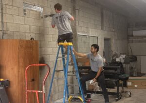 Green Fox Team installing mini split in a home