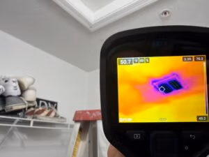 Infrared Thermal Imaging gun detecting temp difference in the ceiling of the master bedroom