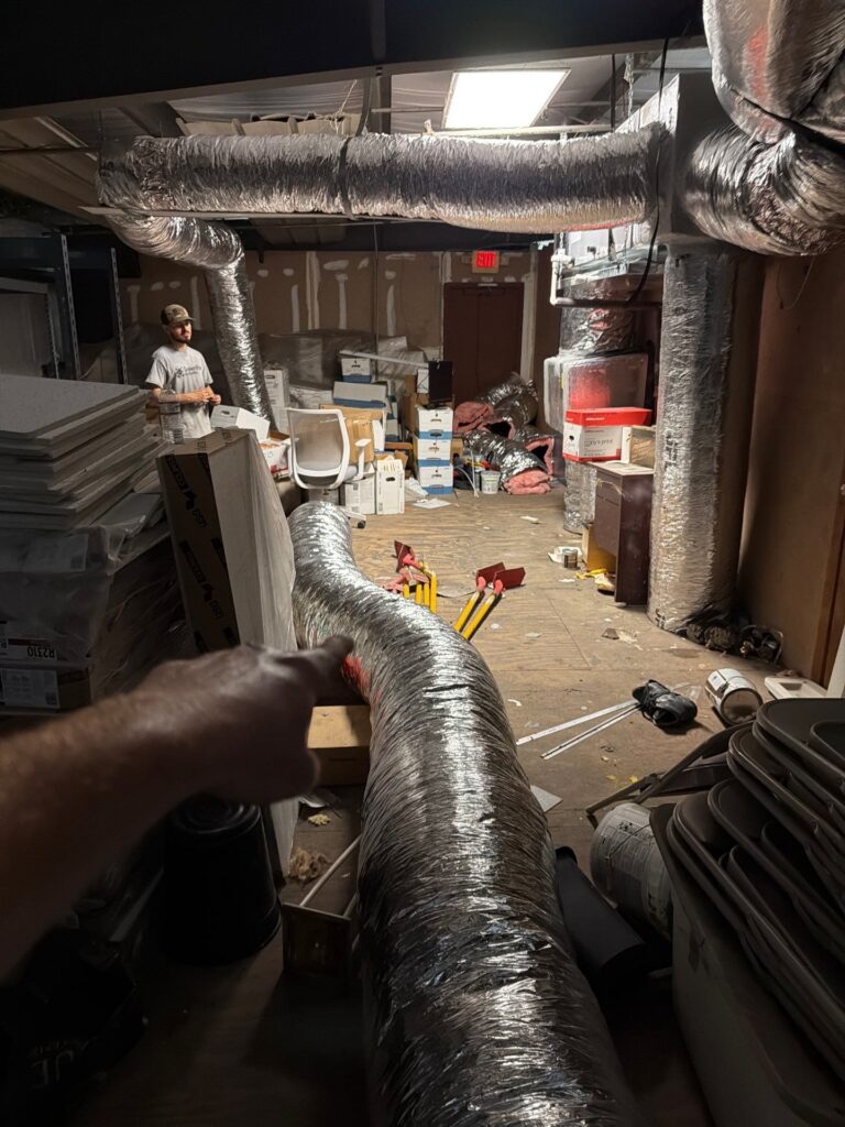 Ductwork lying on ground and ready to be strapped
